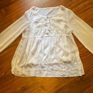 Embroidered top, see through %100 polyester. Comes with a white tube top